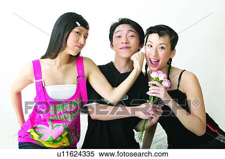 Stock Photography - Head And Shoulders, Teenagers, Teenagers Only, Flower, Three People, Teenager. Fotosearch