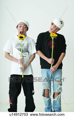 Stock Image - Indoor, White Background, Mouth Open, Close-Up, Petal. Fotosearch