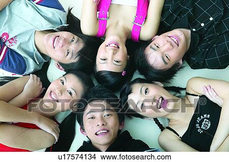 Lifestyles High Angle View, Arms Crossed, Teenage Boys, Teenagers Only, Cheerful, T-Shirt, Braids View Large Photo Image Picture - Lifestyles High Angle View, Arms Crossed, Teenage Boys, Teenagers Only, Cheerful, T-Shirt, Braids. Fotosearch