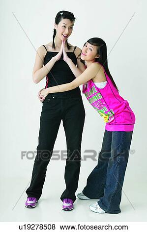 Smiling, Greeting, Friendship, Tank Top, Braids View Large Photo Image Stock Photo - Smiling, Greeting, Friendship, Tank Top, Braids. Fotosearch