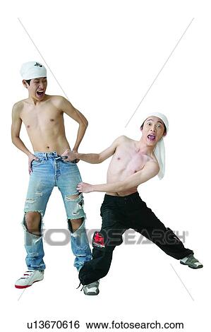 Stock Photograph - Bending, 14-15 Years, Bare Chest, Asian Ethnicity, Adolescence, Bizarre Fashion, 13-14 Years. Fotosearch