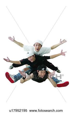 Stock Photography - Black Hair, 16-17 Years, Asian Ethnicity, Arm Outstretched, Adolescence, Cap, 14-15 Years. Fotosearch