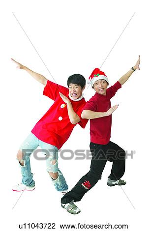 Stock Image - Black Hair, Adolescence, Bizarre Fashion, Bending, Asian Ethnicity, Cheerful, 13-14 Years. Fotosearch