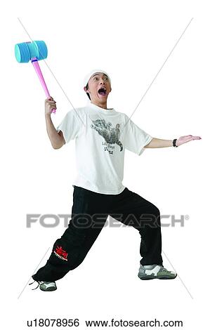 Stock Photograph - Holding, Looking Up, Eccentric, Cut Out. Fotosearch
