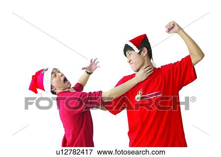 Stock Photo - Indoor, Hitting, Asian Ethnicity, Black Hair, Standing, Conflict. Fotosearch