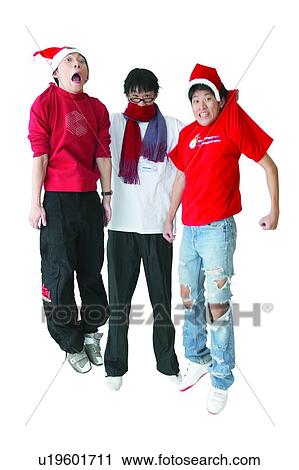 Stock Image - Only Teenage Boys, Scarf, Mouth Open, Facial Expression, Indoor, Jumping. Fotosearch