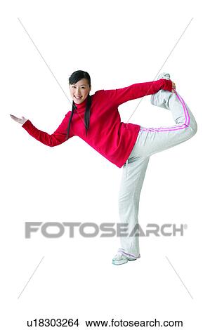 Picture - Portrait, One Teenage Girl Only, Cut Out, Standing On One Leg, Gesturing. Fotosearch