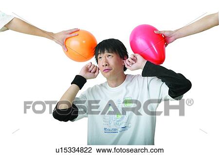 Stock Image - Teenager, T-Shirt, Three People, Human Hand, Looking Up. Fotosearch