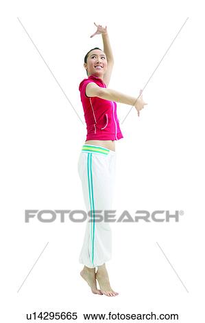 Stock Photography - Tiptoe, Standing, Looking Up, Asian Ethnicity. Fotosearch