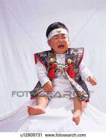 Baby boy crying, wearing costume, front view, portrait View Large Photo Image Stock Image - Baby boy crying, wearing costume, front view, portrait. Fotosearch