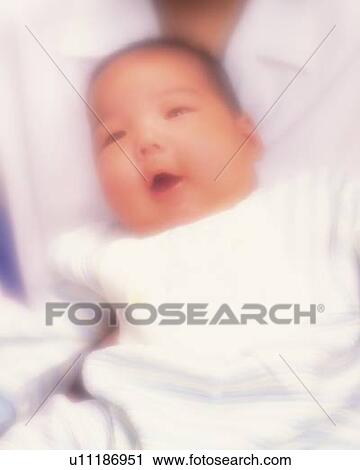 Mother with baby boy, portrait, high angle view, defocused View Large Photo Image Stock Image - Mother with baby boy, portrait, high angle view, defocused. Fotosearch