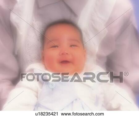 Mother with baby boy, portrait, high angle view, defocused View Large Photo Image Stock Image - Mother with baby boy, portrait, high angle view, defocused. Fotosearch