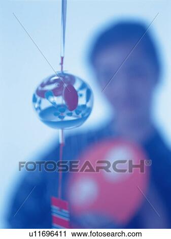 A Japanese wind bell and a woman in yukata, Differential Focus, Toned Image View Large Photo Image Stock Image - A Japanese wind bell and a woman in yukata, Differential Focus, Toned Image. Fotosearch