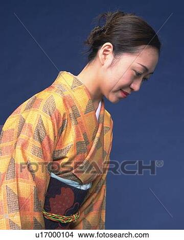 A woman in kimono bowing, Side View View Large Photo Image Picture - A woman in kimono bowing, Side View. Fotosearch