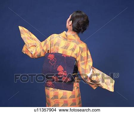 Picture - A woman in kimono dancing, Rear View. Fotosearch