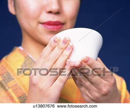 A woman in kimono drinking sake, Low Angle View, Close Up View Large Photo Image Stock Photograph - A woman in kimono drinking sake, Low Angle View, Close Up. Fotosearch