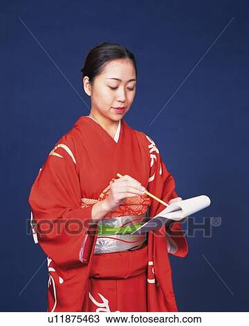 A woman in kimono writing with a calligraphy brush, Side View View Large Photo Image Stock Image - A woman in kimono writing with a calligraphy brush, Side View. Fotosearch