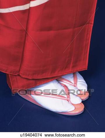 Picture - Feet of a woman in kimono, Close Up, High Angle View. Fotosearch