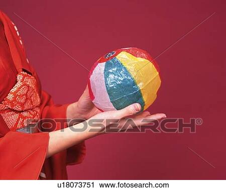 Hands of a woman in kimono holding a Japanese Paper balloon, Close Up, Side View View Large Photo Image Stock Image - Hands of a woman in kimono holding a Japanese Paper balloon, Close Up, Side View. Fotosearch
