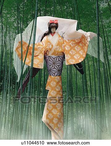 Bamboo grove and Japanese female doll holding a veil, front view, composition View Large Photo Image Stock Image - Bamboo grove and Japanese female doll holding a veil, front view, composition. Fotosearch