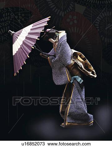 Japanese female doll holding a coarse oilpaper umbrella, side view, black background View Large Photo Image Stock Image - Japanese female doll holding a coarse oilpaper umbrella, side view, black background. Fotosearch