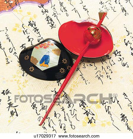 Painted clamshells and Japanese hairpin on paper written Japanese poem, high angle view View Large Photo Image Stock Photo - Painted clamshells and Japanese hairpin on paper written Japanese poem, high angle view. Fotosearch