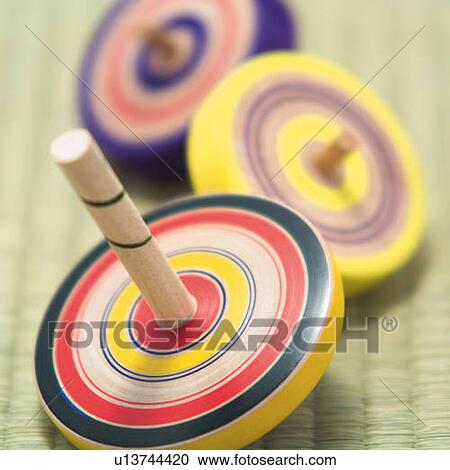 Three spinning tops on Tatami mat, high angle view, close up, differential focus View Large Photo Image Stock Image - Three spinning tops on Tatami mat, high angle view, close up, differential focus. Fotosearch
