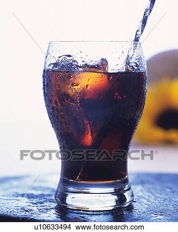 Picture - A glass of iced coffee, front view, white background, differential focus. Fotosearch