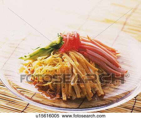 Cold noodles with sliced vegetable on plate, high angle view, differential focus View Large Photo Image Stock Photography - Cold noodles with sliced vegetable on plate, high angle view, differential focus. Fotosearch