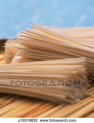 Japanese noodles in bundles, high angle view, close up, differential focus View Large Photo Image Stock Image - Japanese noodles in bundles, high angle view, close up, differential focus. Fotosearch