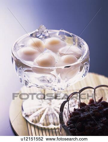 Rice dumpling in cold water, high angle view, differential focus, blue background View Large Photo Image Stock Image - Rice dumpling in cold water, high angle view, differential focus, blue background. Fotosearch