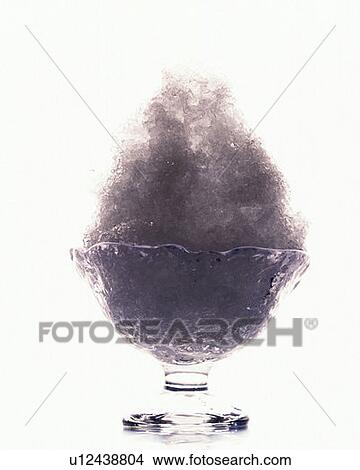 Picture - Shaved ice with purple syrup, front view, white background, cut out. Fotosearch