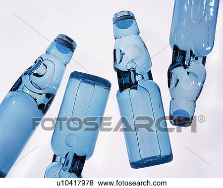 Soda bottles, high angle view, white background, cut out View Large Photo Image Stock Photo - Soda bottles, high angle view, white background, cut out. Fotosearch
