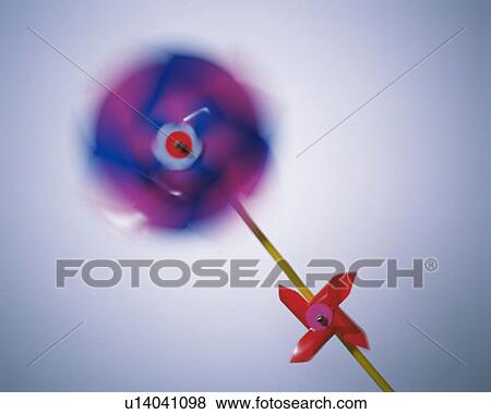 Spinning pinwheel, front view, blurred motion View Large Photo Image Stock Photo - Spinning pinwheel, front view, blurred motion. Fotosearch