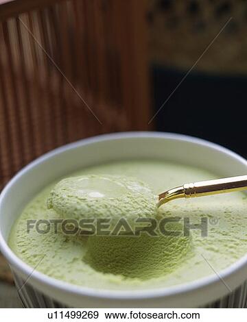 Spoon scooping green tea ice cream, high angle view, differential focus View Large Photo Image Stock Photo - Spoon scooping green tea ice cream, high angle view, differential focus. Fotosearch