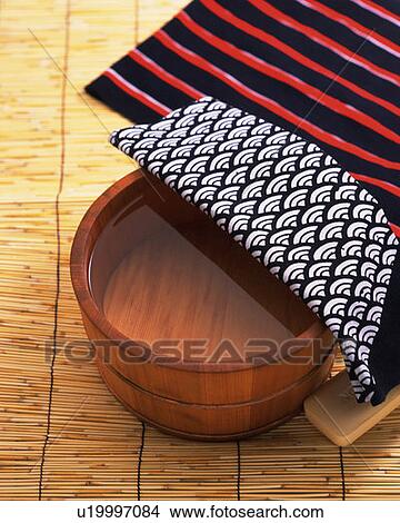 Tub of water and towel, high angle view View Large Photo Image Picture - Tub of water and towel, high angle view. Fotosearch
