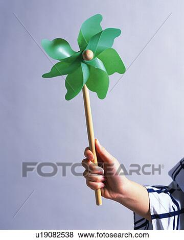 Woman in yukata holding a pinwheel, front view, white background View Large Photo Image Stock Photo - Woman in yukata holding a pinwheel, front view, white background. Fotosearch
