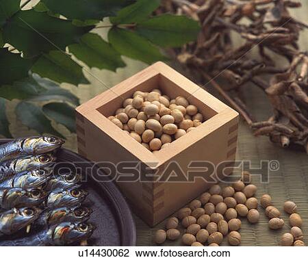 Stock Image - Beans in square box for bean-scattering ceremony celebrating the coming of spring, high angle view, differential focus. Fotosearch