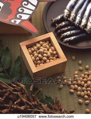 Stock Photo - Beans in square box for bean-scattering ceremony celebrating the coming of spring, high angle view. Fotosearch