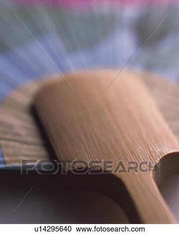 Stock Image - Japanese fan, high angle view, close up, differential focus. Fotosearch