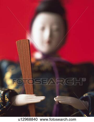 Japanese male figurine, front view, red background, differential focus View Large Photo Image Stock Image - Japanese male figurine, front view, red background, differential focus. Fotosearch