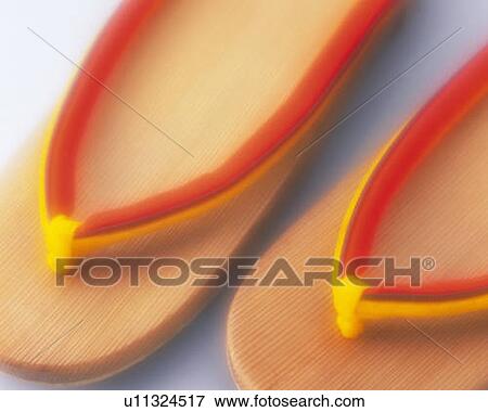 Japanese sandals, high angle view, close up, white background, soft focus View Large Photo Image Stock Photo - Japanese sandals, high angle view, close up, white background, soft focus. Fotosearch