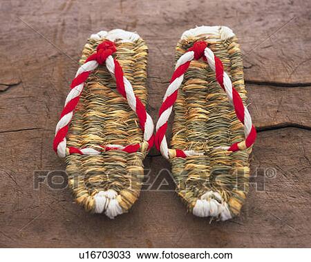 Stock Image - Japanese straw sandals, high angle view. Fotosearch