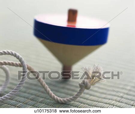 Rope and spinning top on Tatami mat, high angle view, differential focus View Large Photo Image Stock Photo - Rope and spinning top on Tatami mat, high angle view, differential focus. Fotosearch