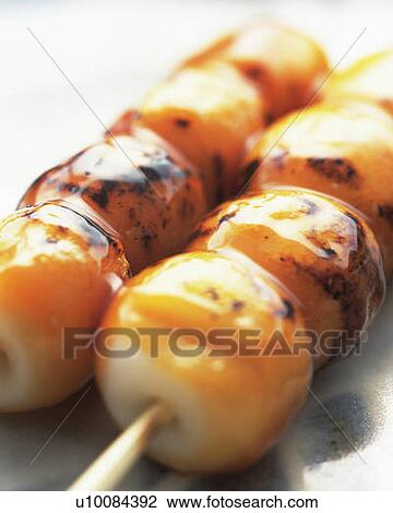 Sticks of toasted dumplings, high angle view, close up, differential focus View Large Photo Image Stock Image - Sticks of toasted dumplings, high angle view, close up, differential focus. Fotosearch