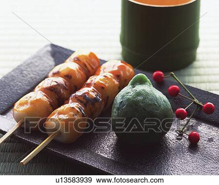 Sticks of toasted dumplings on plate, high angle view, differential focus View Large Photo Image Stock Photo - Sticks of toasted dumplings on plate, high angle view, differential focus. Fotosearch