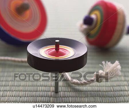 Three spinning tops on Tatami mat, high angle view, differential focus View Large Photo Image Stock Photo - Three spinning tops on Tatami mat, high angle view, differential focus. Fotosearch