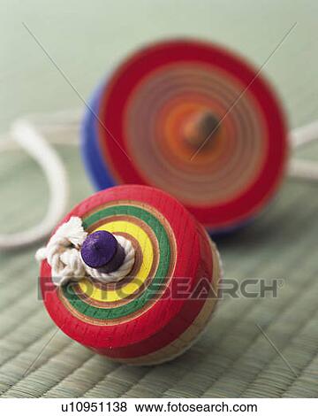 Two spinning tops on Tatami mat, high angle view, differential focus View Large Photo Image Stock Photo - Two spinning tops on Tatami mat, high angle view, differential focus. Fotosearch