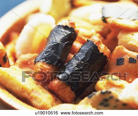 Various Japanese rice crackers in bowl, high angle view, close up, differential focus View Large Photo Image Stock Photograph - Various Japanese rice crackers in bowl, high angle view, close up, differential focus. Fotosearch