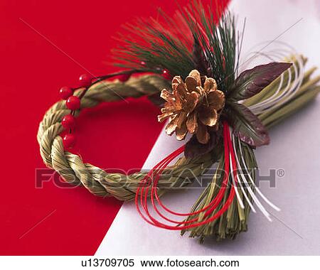 Wreath for New Year's Day on white paper, high angle view, red background View Large Photo Image Stock Photography - Wreath for New Year's Day on white paper, high angle view, red background. Fotosearch